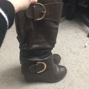 Mocha brown below the knee boots.